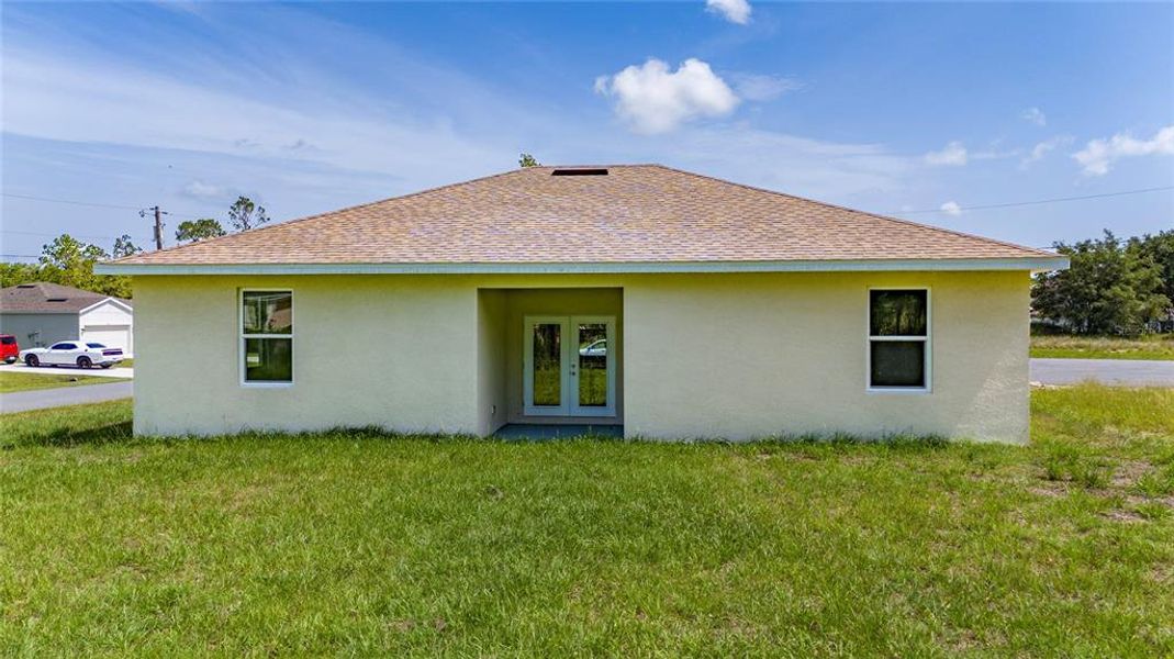 Front exterior of a new home in , Kissimmee, FL, highlighting curb appeal (Image 15).