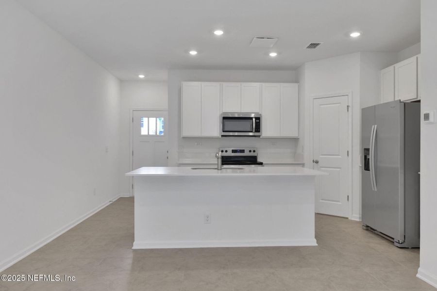 Furnished interior view inside a new home in Atlantis Pointe, Middleburg (Image 4).