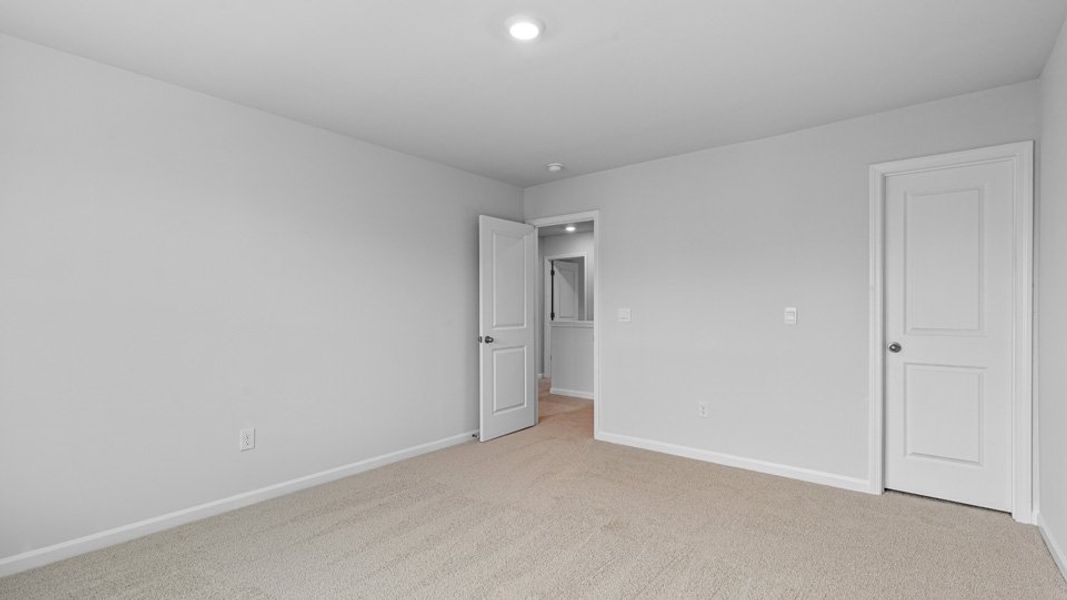 Spacious, unfurnished interior of a new home in The Reserve at Stoney Creek, Whitsett (Image 20).