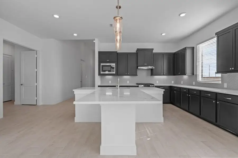 Furnished interior view inside a new home in Attwater, Waller (Image 6).