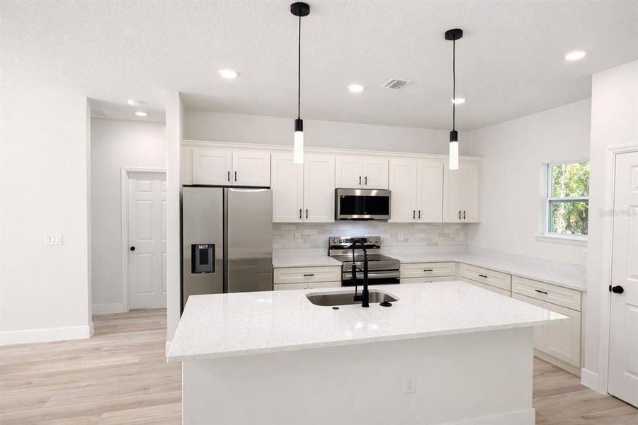 Furnished interior view inside a new home in , Dunnellon (Image 9).