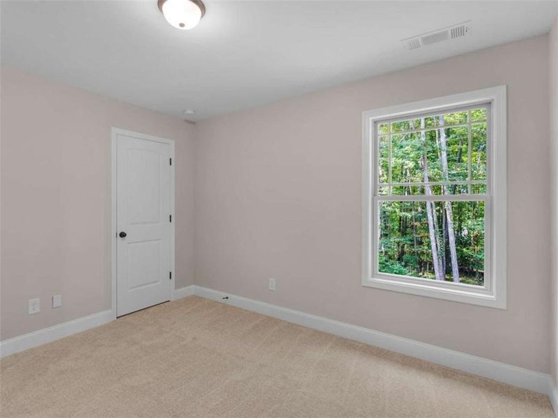 Spacious, unfurnished interior of a new home in , Monticello (Image 36).