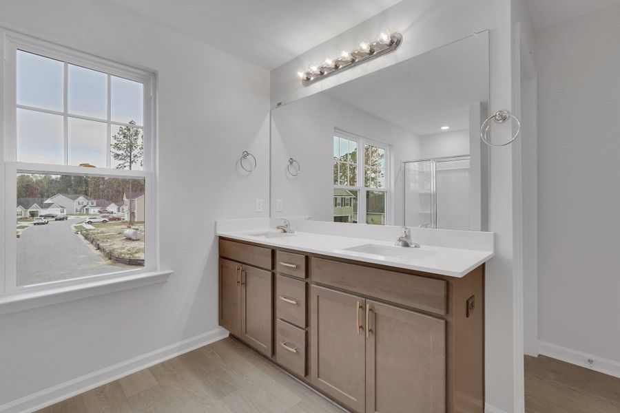 Representative furnished interior of a home built from the The Birch by Smith Family Homes in Sweetwater, Brunswick (Image 13).