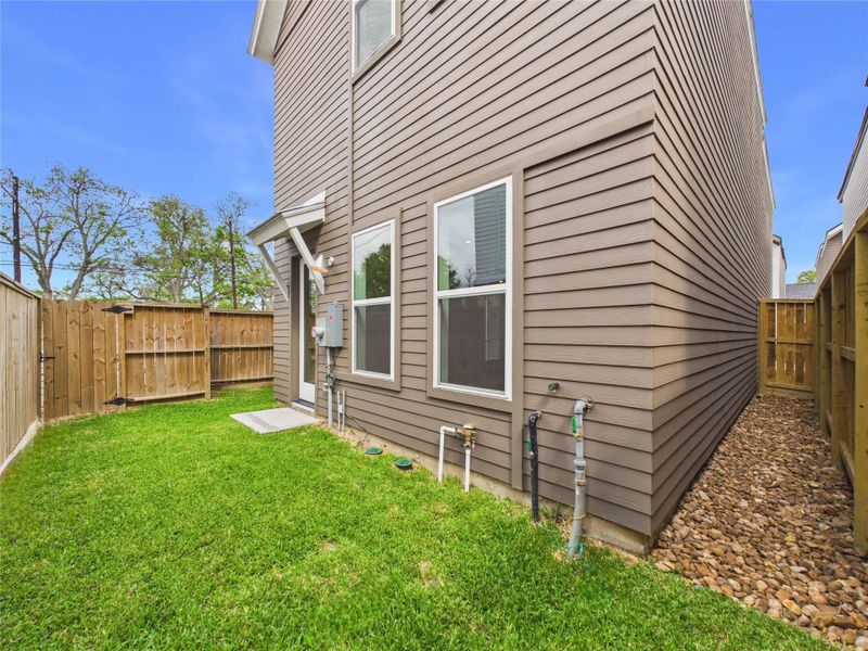 Exterior details and patio area of a home in , Houston (Image 18).