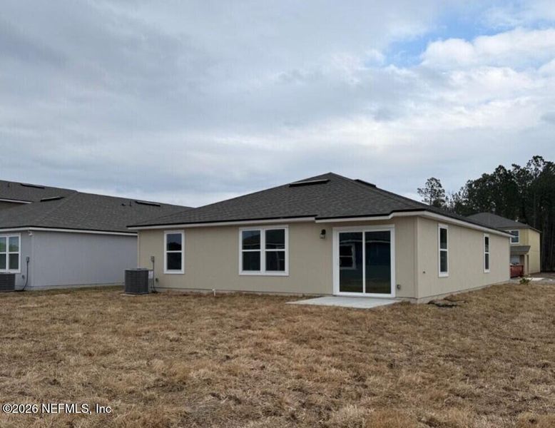 Exterior details and patio area of a home in The Arbors, Jacksonville (Image 3).