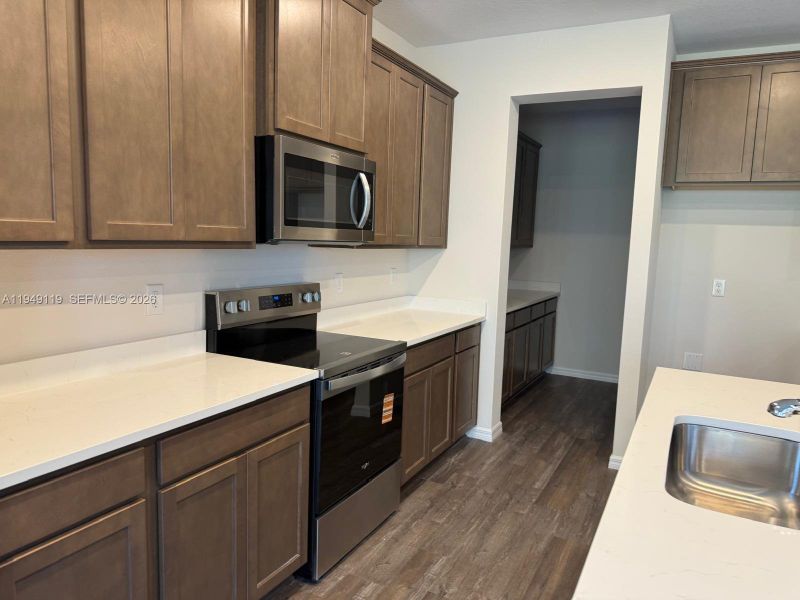 Furnished interior view inside a new home in , Land O' Lakes (Image 7).
