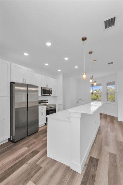Furnished interior view inside a new home in , Punta Gorda (Image 10).
