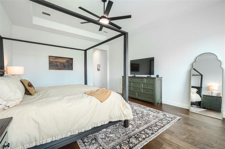 Bedroom featuring dark wood finished floors and ceiling fan