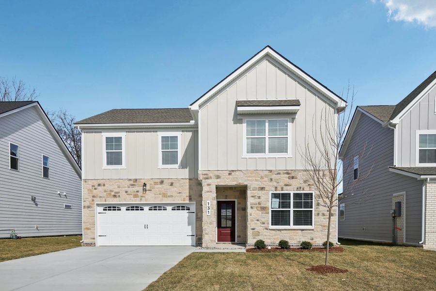 Front exterior of a new home in Ascent at Arbor Ridge, La Vergne, TN, highlighting curb appeal (Image 1). Front exterior of a new home in Ascent at Arbor Ridge, La Vergne, TN, highlighting curb appeal (Image 1).