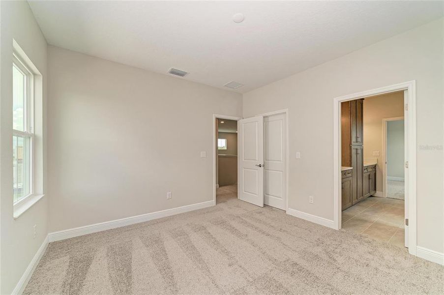 Spacious, unfurnished interior of a new home in North River Ranch, Parrish (Image 32).