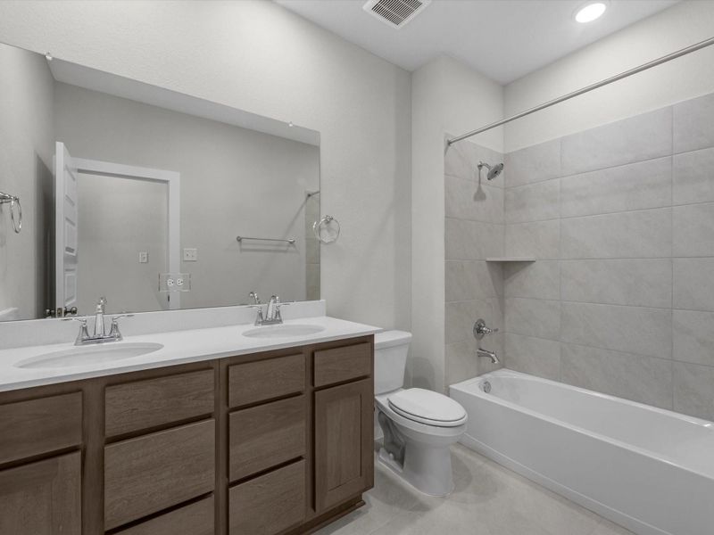 Furnished interior view inside a new home in Mason Woods, Cypress (Image 5).