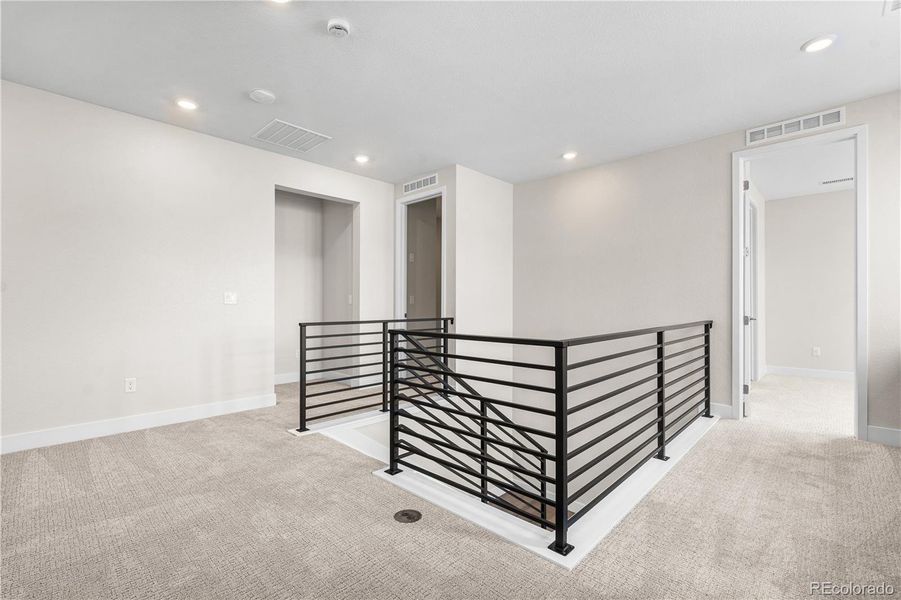 Furnished interior view inside a new home in Storytellers at Lyric, Lone Tree (Image 11).