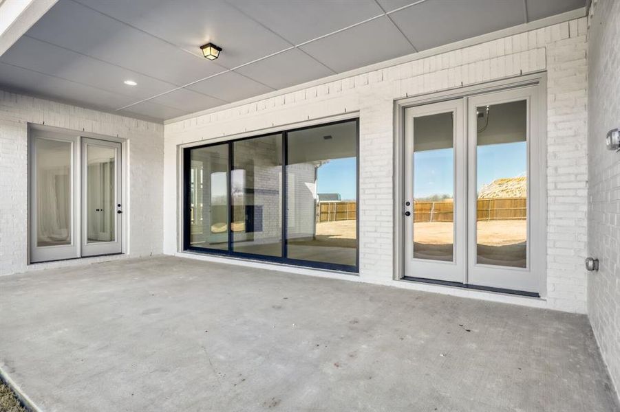 View of patio featuring french doors