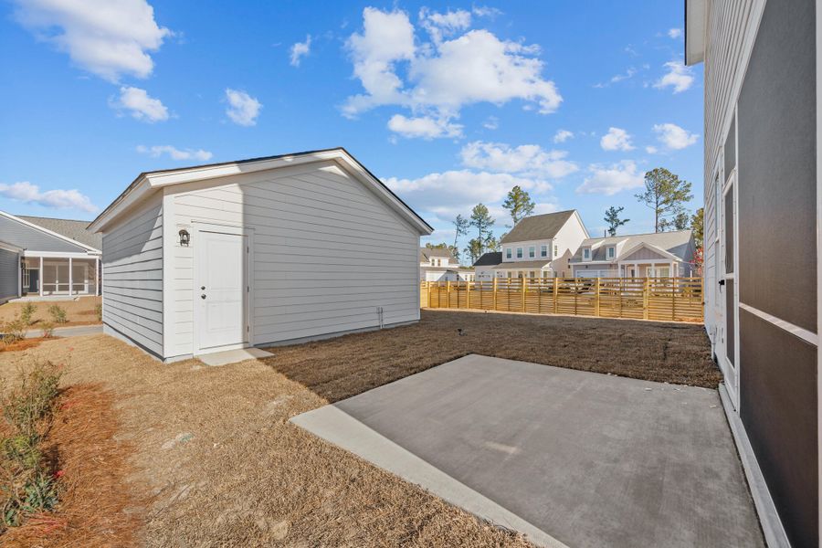 Exterior details and patio area of a home in Nexton, Summerville (Image 28).