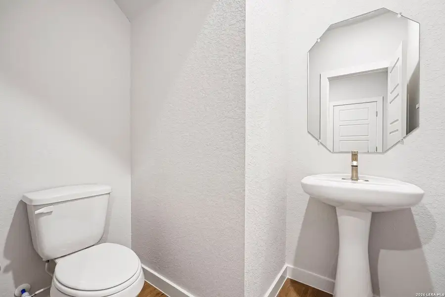 Furnished interior view inside a new home in Weston Oaks, San Antonio (Image 8).