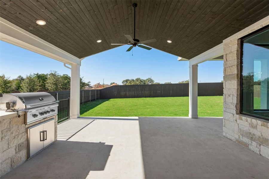 Exterior details and patio area of a home in Riverstone, Georgetown (Image 3).