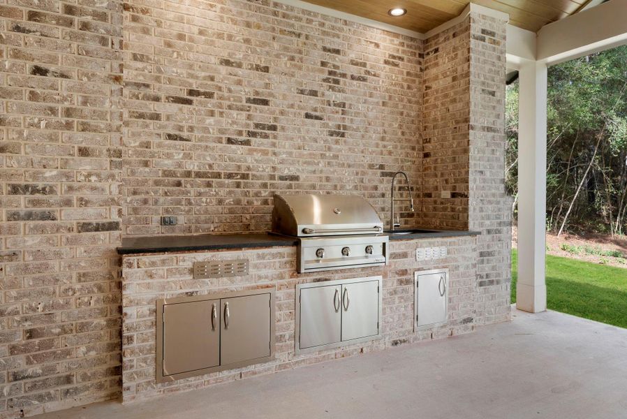 Exterior details and patio area of a home in , New Waverly (Image 33). Exterior details and patio area of a home in , New Waverly (Image 33).