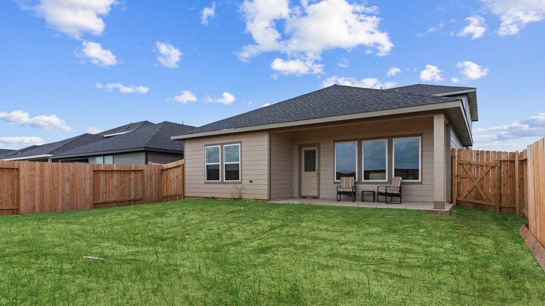 Exterior details and patio area of a home in Tamarron, Fulshear (Image 3).