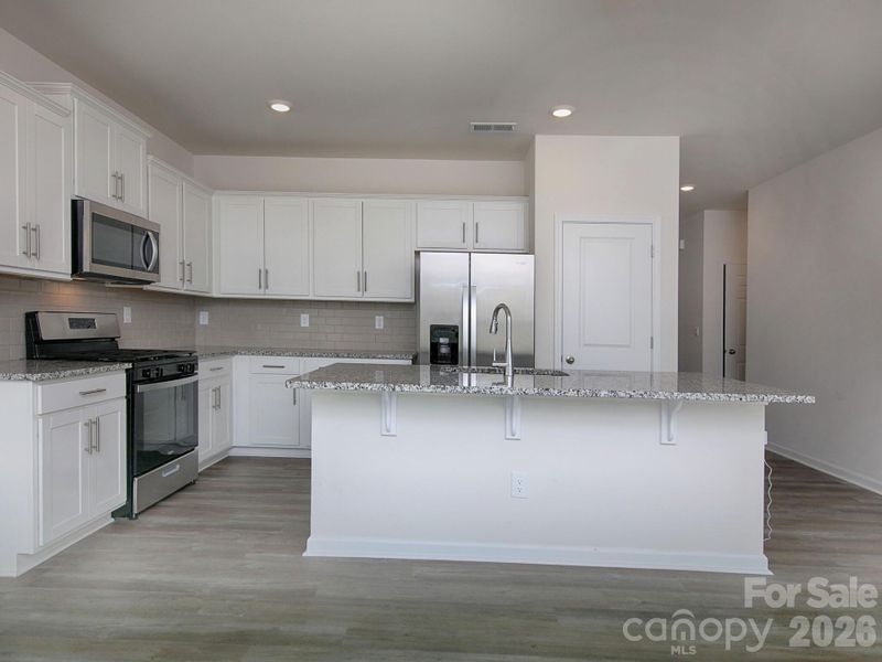 Furnished interior view inside a new home in Villas at Sherrills Ford, Terrell (Image 14).