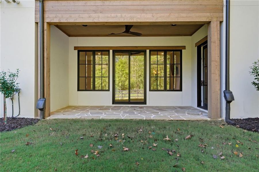 Exterior details and patio area of a home in Crossroads, Alpharetta (Image 32).