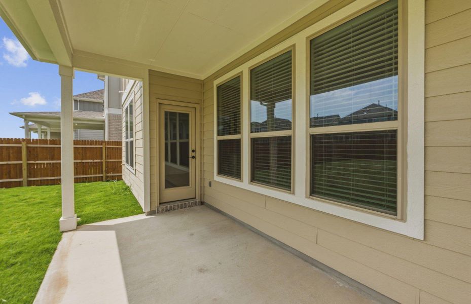 Exterior details and patio area of a home in Santa Rita Ranch, Liberty Hill (Image 21).