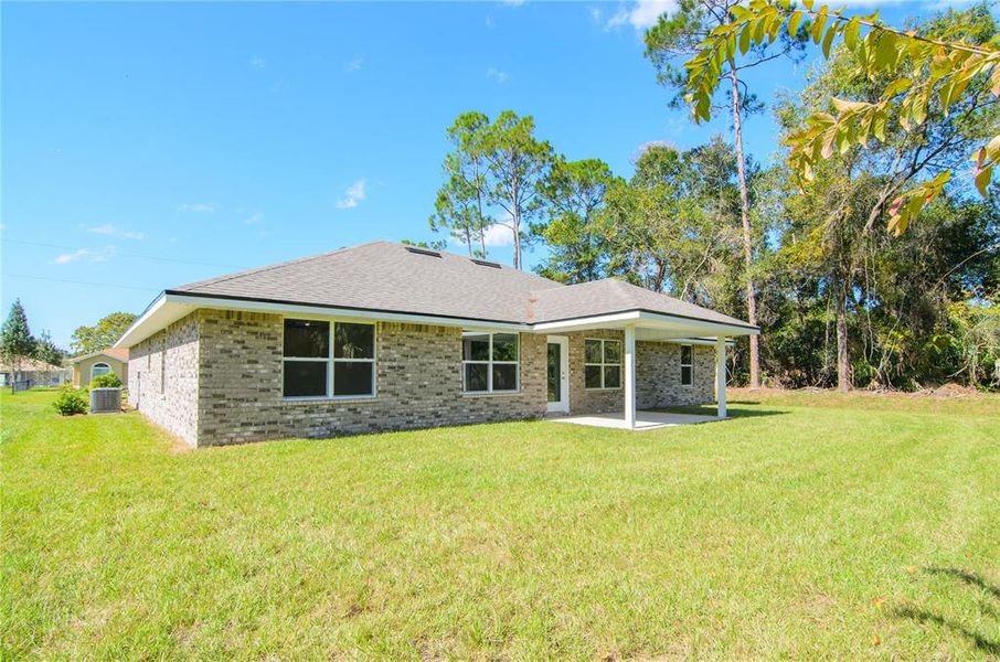 Exterior details and patio area of a home in Palm Coast, Palm Coast (Image 19).