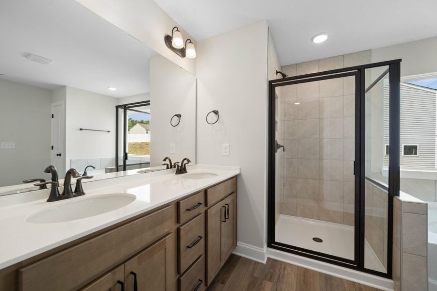 Furnished interior view inside a new home in Cottages at Piper Village, Trinity (Image 13).