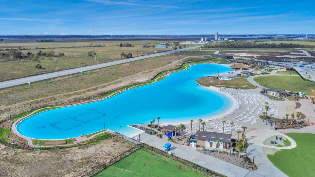 Step into your backyard oasis with Angel Lagoon’s crystal blue waters and white sandy beaches creating a vacation-like atmosphere year-round. Step into your backyard oasis with Angel Lagoon’s crystal blue waters and white sandy beaches creating a vacation-like atmosphere year-round.