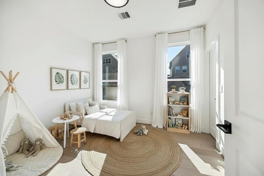 Soaring ceilings in secondary bedroom. Soaring ceilings in secondary bedroom.