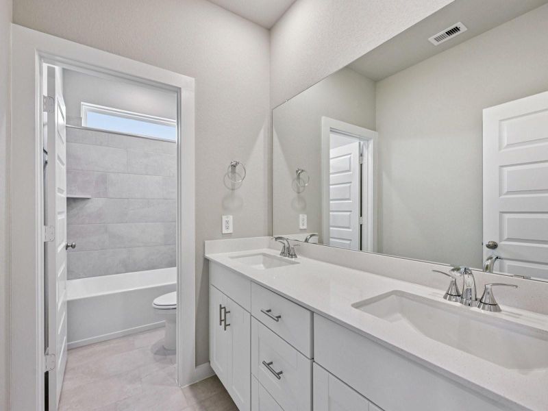 Furnished interior view inside a new home in Spring Brook Village - City Series, Houston (Image 17).