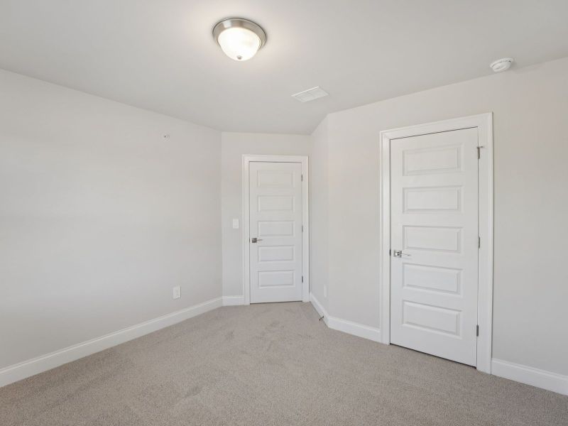 Spacious, unfurnished interior of a new home in Hemingway - Highland Series, Cumming (Image 17).
