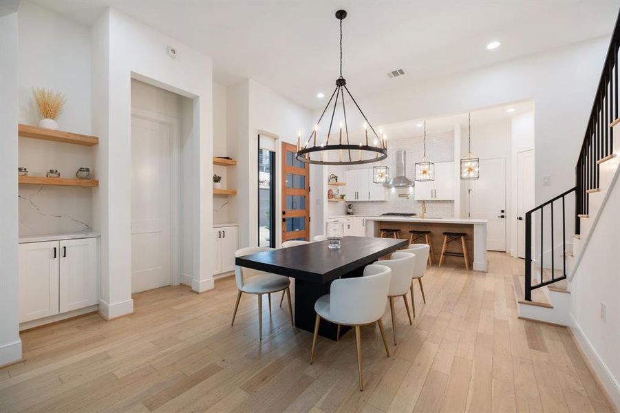 Seamlessly connected to the kitchen, the dining area offers an inviting space for formal meals and casual dining alike.