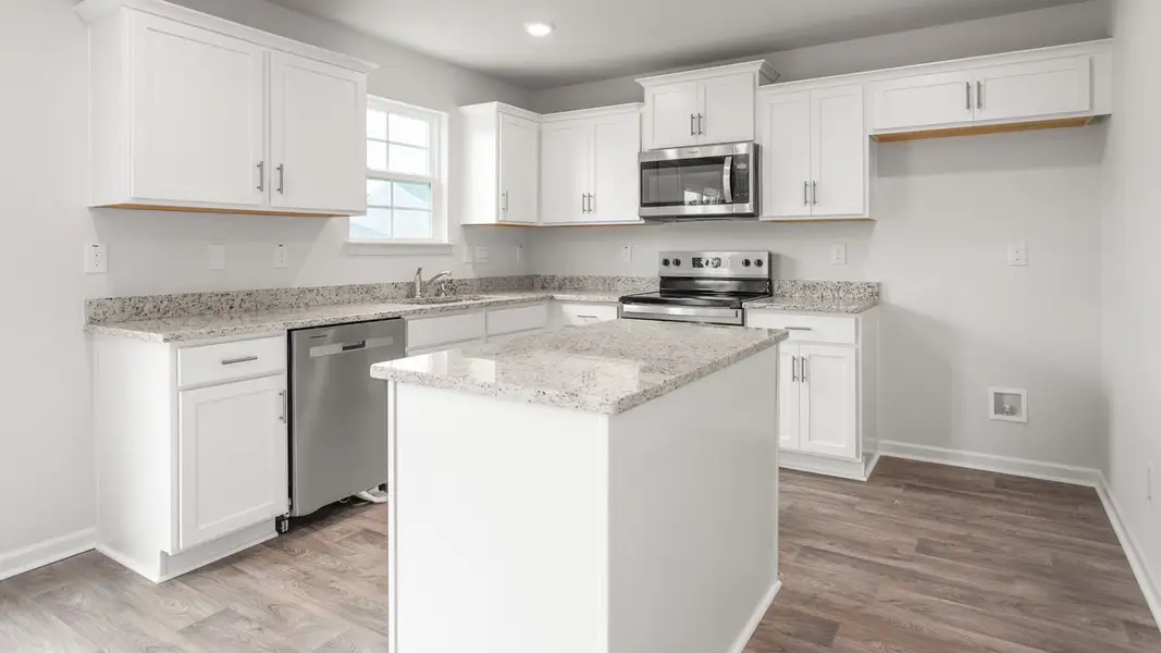 Representative furnished interior of a home built from the Kyle by D.R. Horton in Foxtail, Yadkinville (Image 4).