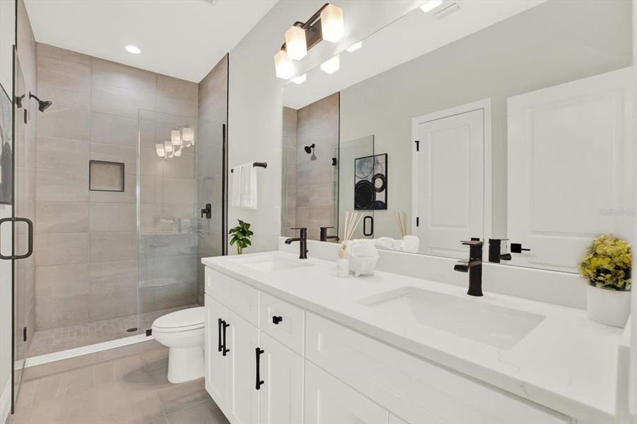 Furnished interior view inside a new home in The Towns At Long Bayou, Seminole (Image 10). Furnished interior view inside a new home in The Towns At Long Bayou, Seminole (Image 10).