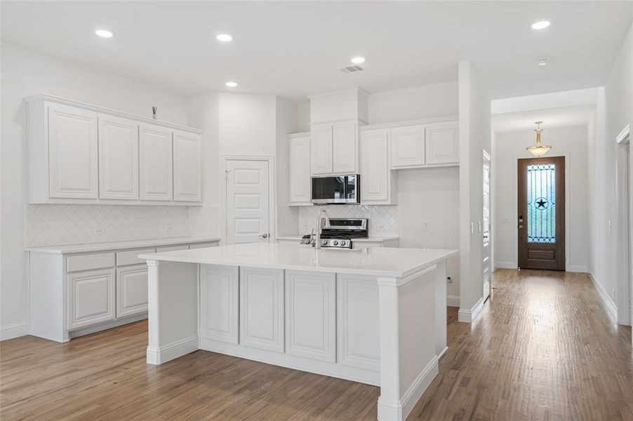 Furnished interior view inside a new home in Stone River Glen, Royse City (Image 7).