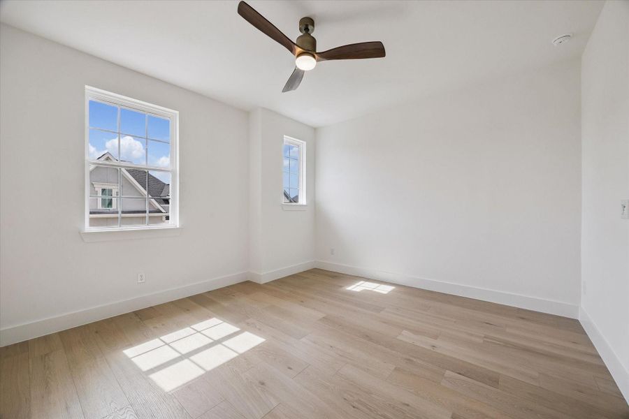 The Ariana plan features three bedrooms: the primary and a secondary bedroom on the third floor, and an additional bedroom on the first floor. Each bedroom includes a full, private bathroom.