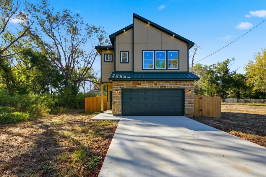 Front exterior of a new home in , Cleveland, TX, highlighting curb appeal (Image 15).