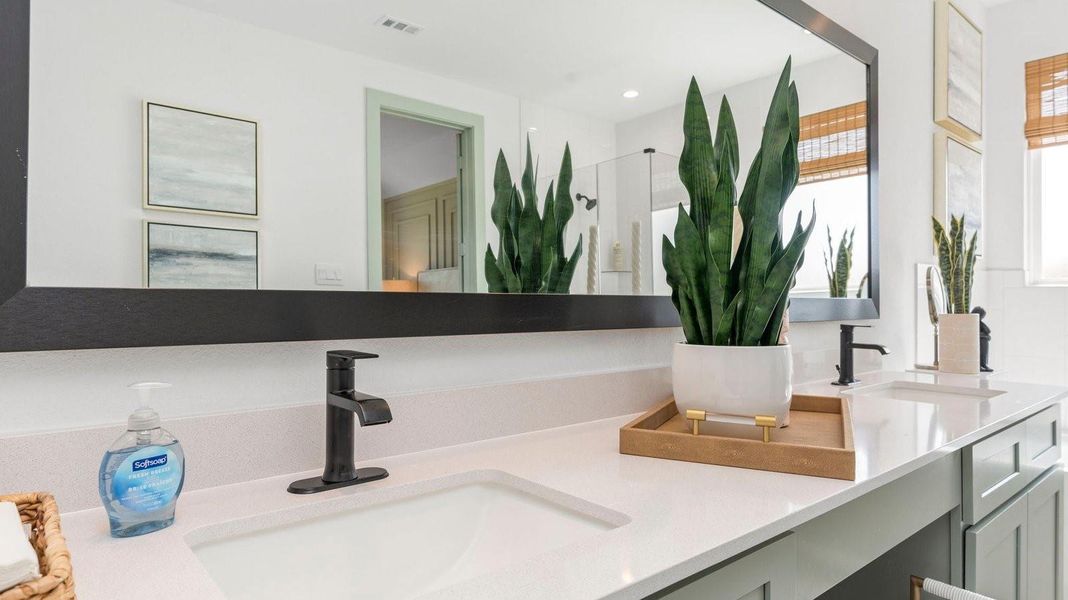 A well-designed bathroom equipped with granite countertops, a standing tub, and a single vanity. A well-designed bathroom equipped with granite countertops, a standing tub, and a single vanity.