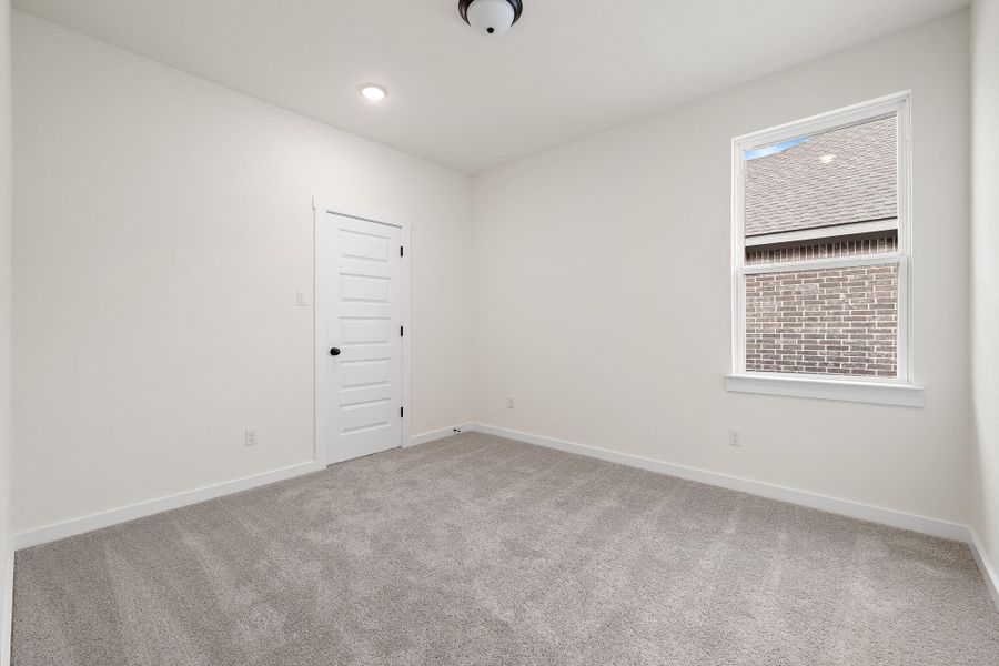 Secondary Bedroom 1 with shared bathroom