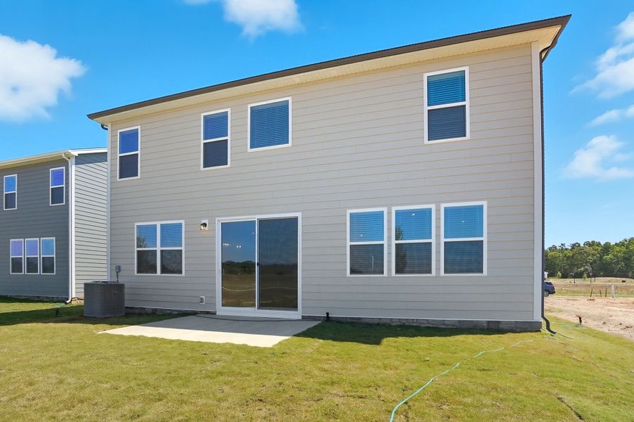 Front exterior of a new home in Waxhaw Landing, Monroe, NC, highlighting curb appeal (Image 2).