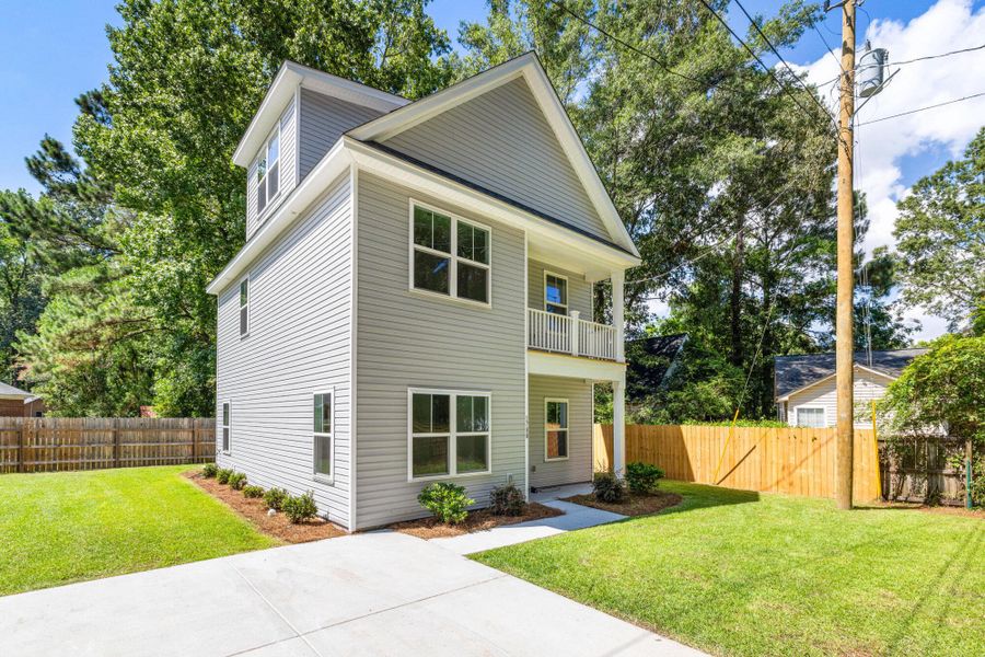 Front exterior of a new home in , Charleston, SC, highlighting curb appeal (Image 23).