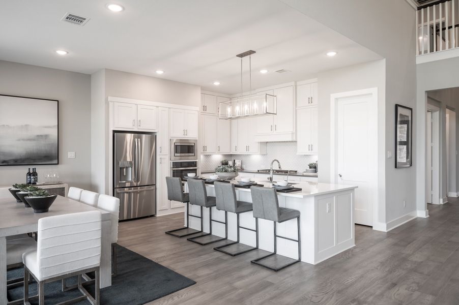 Representative furnished interior of a home built from the Barnhart by Tri Pointe Homes in Dunham Pointe, Cypress (Image 15).