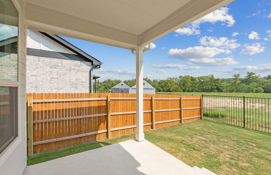 Exterior details and patio area of a home in Saddleback at Santa Rita Ranch, Liberty Hill (Image 3). Exterior details and patio area of a home in Saddleback at Santa Rita Ranch, Liberty Hill (Image 3).