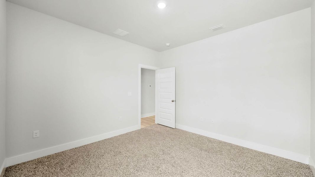 Representative unfurnished interior of a home built from the The Kennedy by D.R. Horton in Titus Park, Panama City (Image 23).