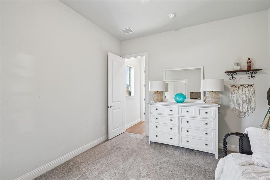 Furnished interior view inside a new home in Ridge Crossing, Waxahachie (Image 9).
