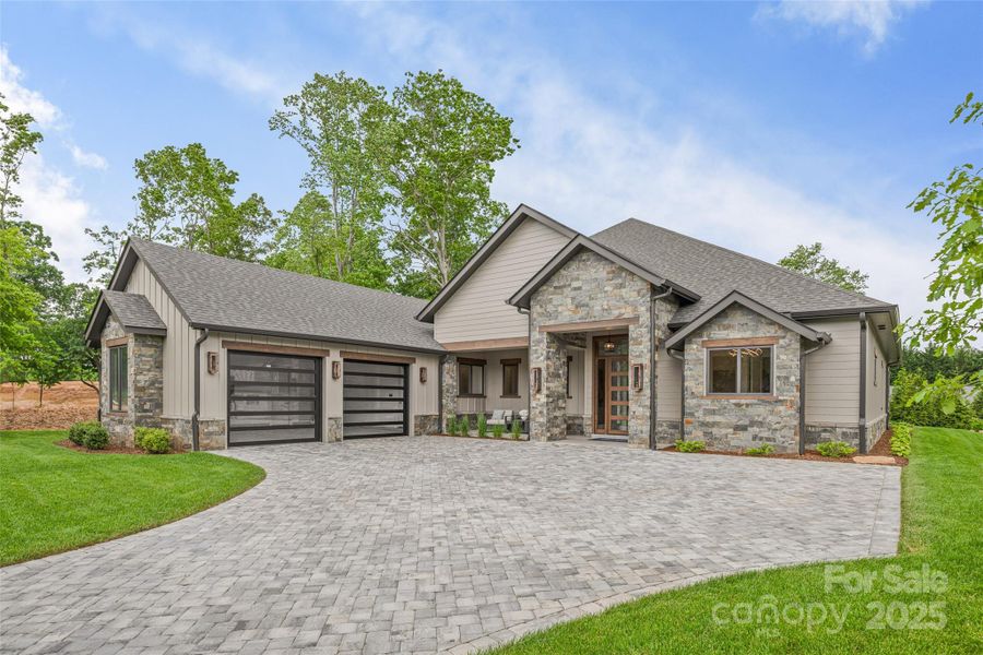 Front exterior of a new home in , Arden, NC, highlighting curb appeal (Image 18). Front exterior of a new home in , Arden, NC, highlighting curb appeal (Image 18).