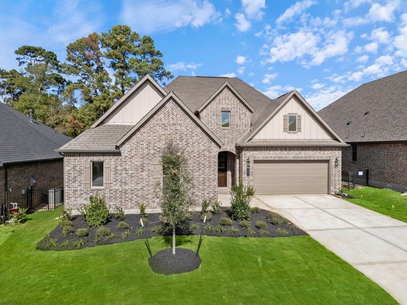 Front exterior of a new home in Chambers Creek, Willis, TX, highlighting curb appeal (Image 16).