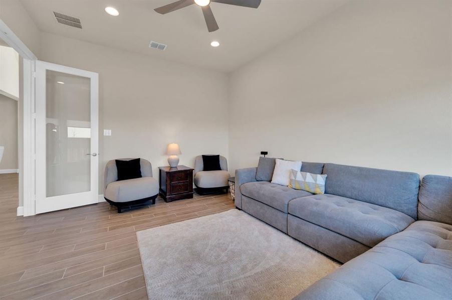 This versatile room serves your needs as a second living area for use as a media room or game room.