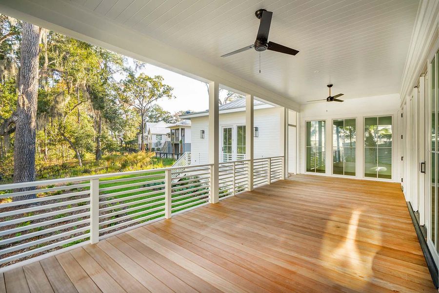 Exterior details and patio area of a home in , Johns Island (Image 25).