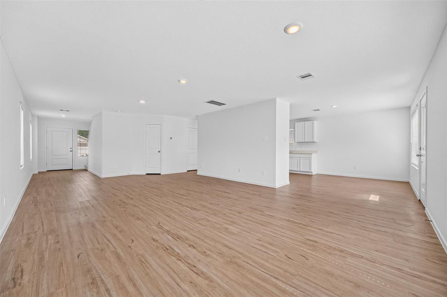 Living room is open to the kitchen area. Living room is open to the kitchen area.